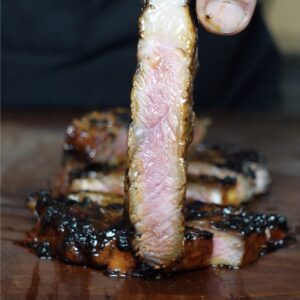 A slice of medium rare steak.